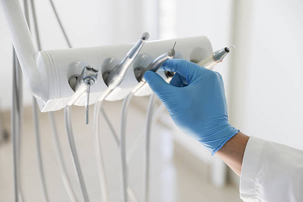 Professional Emergency Dentist technician working in Watergate, FL